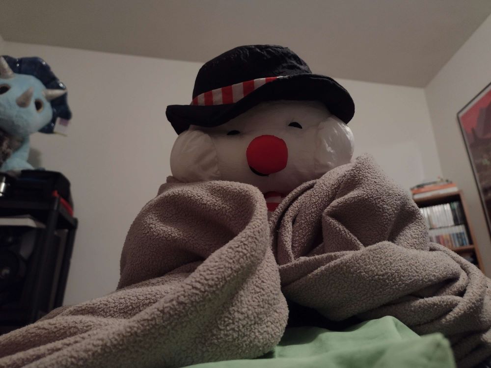Snowman...keeping warm(?)