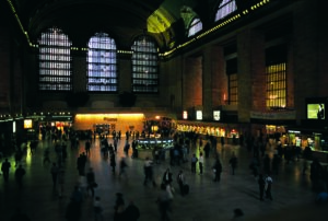 A crowd of travelers in a train station