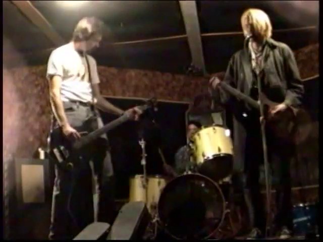 Nirvana playing "On a Plain" in a barn